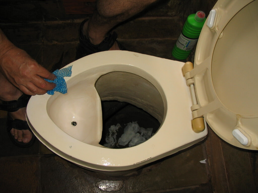 Cleaning a urine-diverting dry toilet (UDDT) Toilet Surgery for Toilet Unclogging
