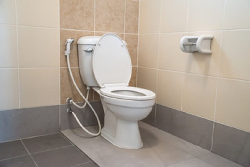two piece toilet in a bathroom which to decide a one piece vs two piece toilet