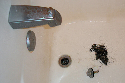 Plumbing problems: Bathtub drain with gobs of a gross hair clog removed